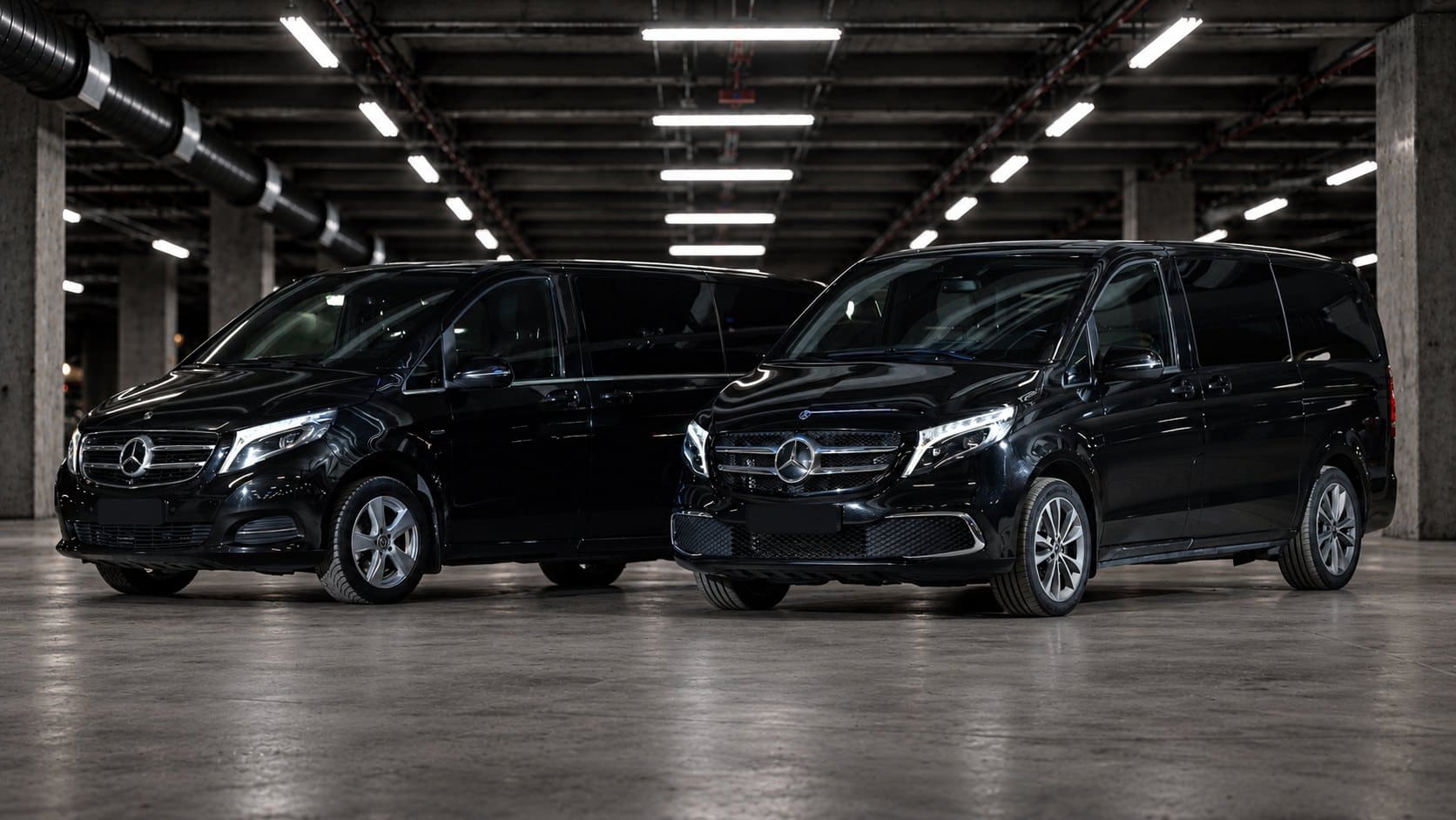 Two Mercedes-Benz V-Class of the LuxCar fleet in the garage